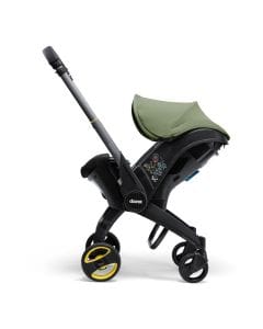 Doona I Infant Car Seat, Integrated Auto Adjust 5-Point Harness, Sleek And Ergonomic Design, Quick Release Wheels, Side Impact Protection - Desert Green