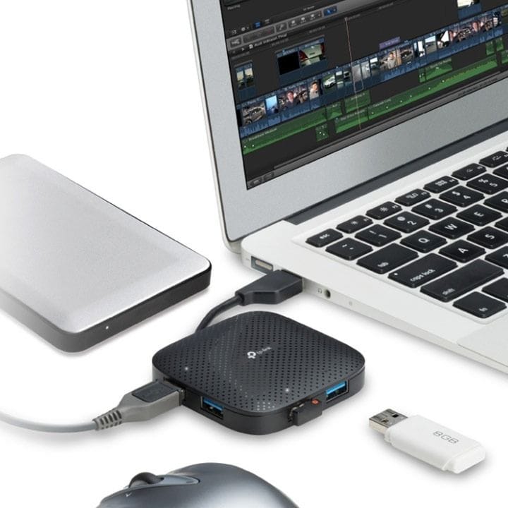 موزع تي بي لينك USB 3.0 بأربعة منافذ بسرعة نقل بيانات عالية 5 جيجابت في الثانية مع التوصيل والتشغيل وتصميم مدمج للسفر لأجهزة اللابتوب والكمبيوتر أسود UH400