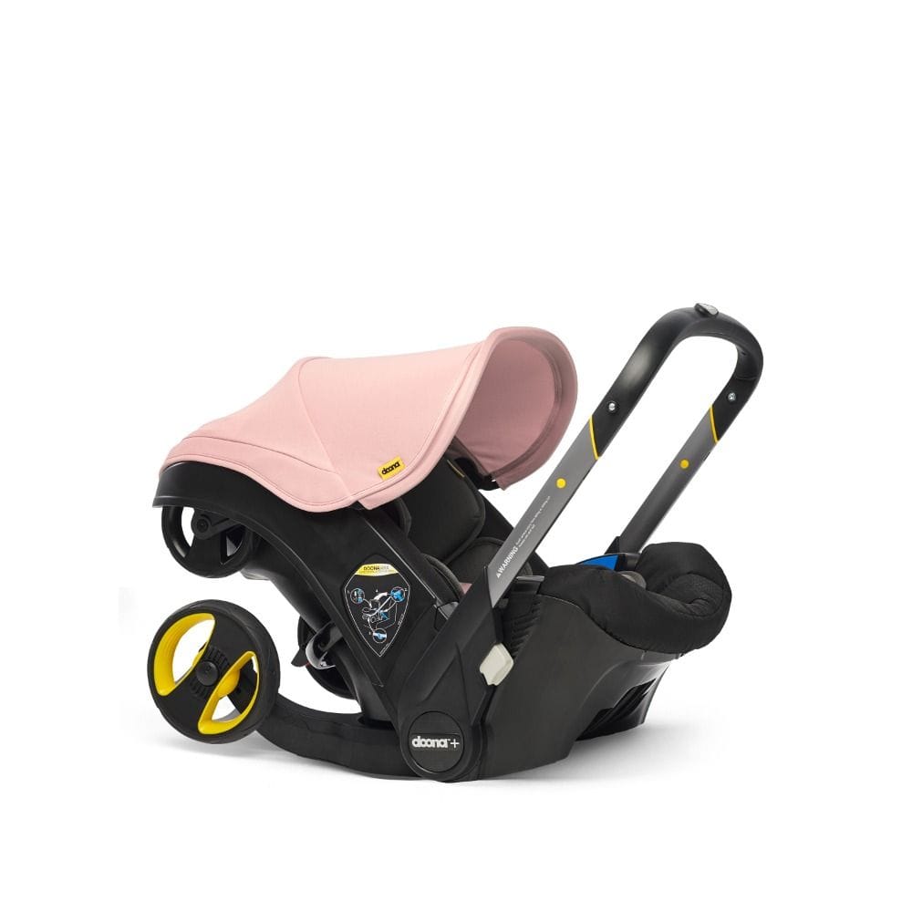 Doona Infant Car Seat And Stroller, Folds And Unfolds With The Click Of A Button, Removable And Washable Textiles, 5-point Harness - Blush Pink