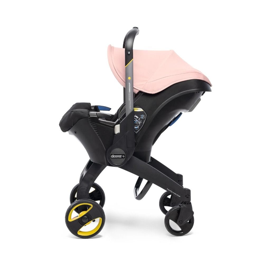 Doona Infant Car Seat And Stroller, Folds And Unfolds With The Click Of A Button, Removable And Washable Textiles, 5-point Harness - Blush Pink