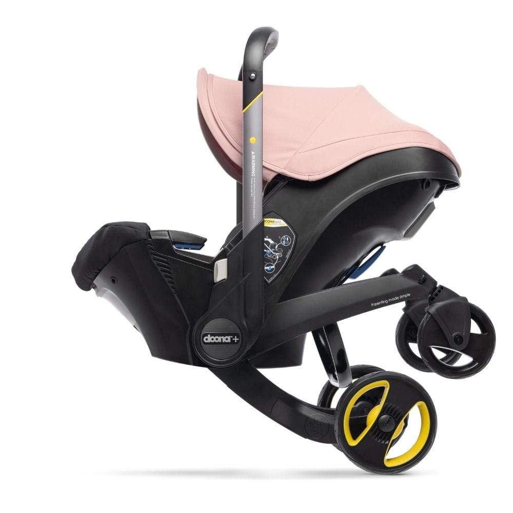 Doona Infant Car Seat And Stroller, Folds And Unfolds With The Click Of A Button, Removable And Washable Textiles, 5-point Harness - Blush Pink