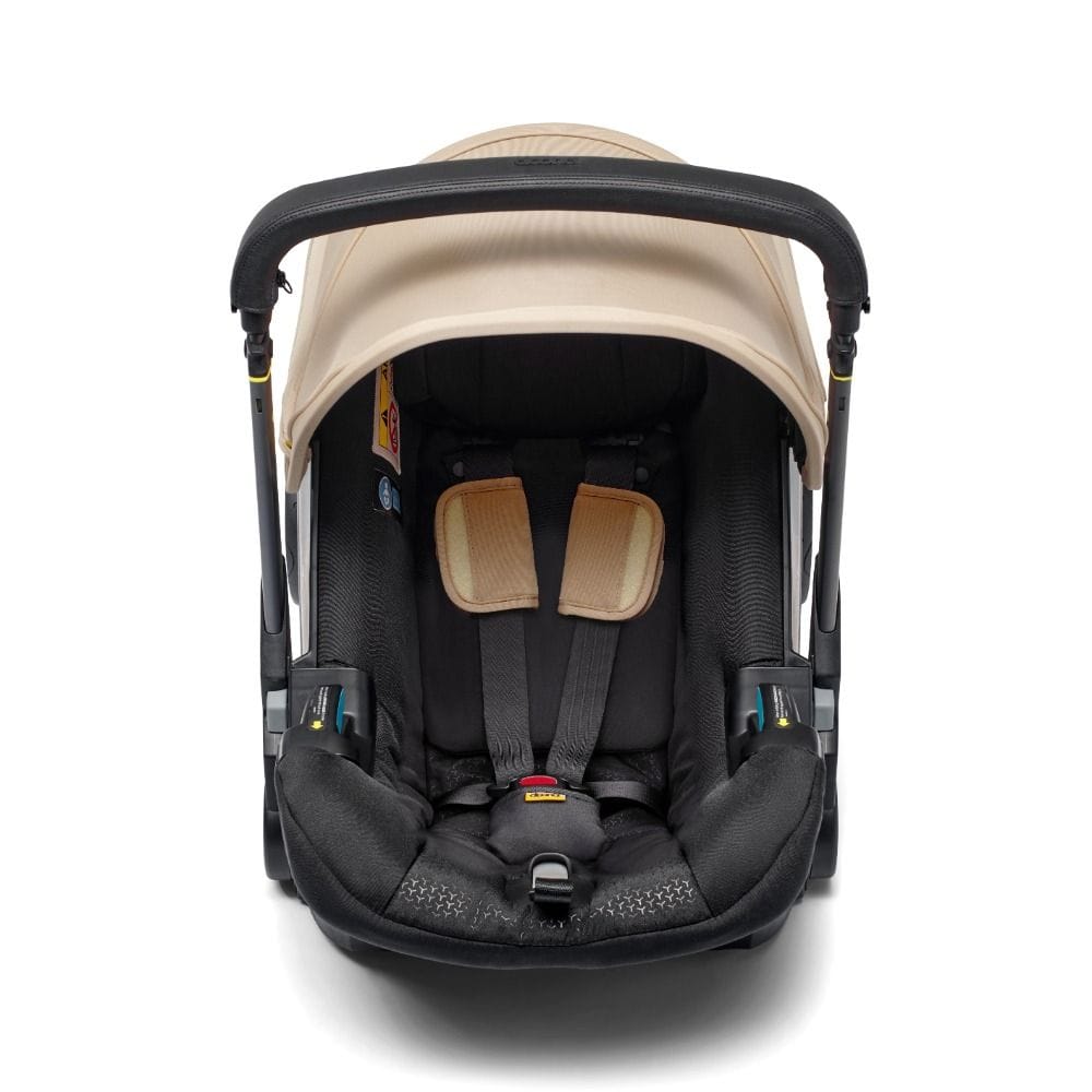 Doona I Infant Car Seat, Integrated Auto Adjust 5-Point Harness, Sleek And Ergonomic Design, Quick Release Wheels, Side Impact Protection - Sahara Sand